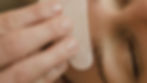 Eye-level view of a serene spa setting with gua sha tools and natural oils