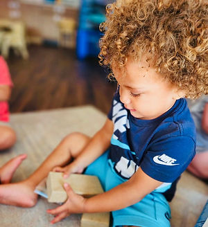 Child playing with blocks