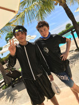 Two DA·VINCI junior high students gathered outdoors during a field trip to Uken Beach Uruma