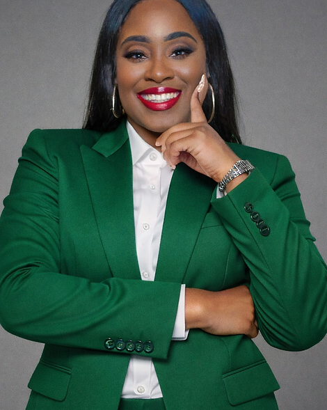 Elegant professional in green blazer.png