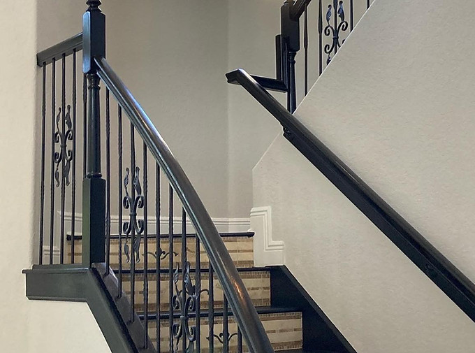 Luxury staircase painting with custom trim and high-wall finishes in Boca Raton, FL by All Florida Colors Painting.