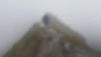 Person in fog on mountain, bad weather, poor visibility