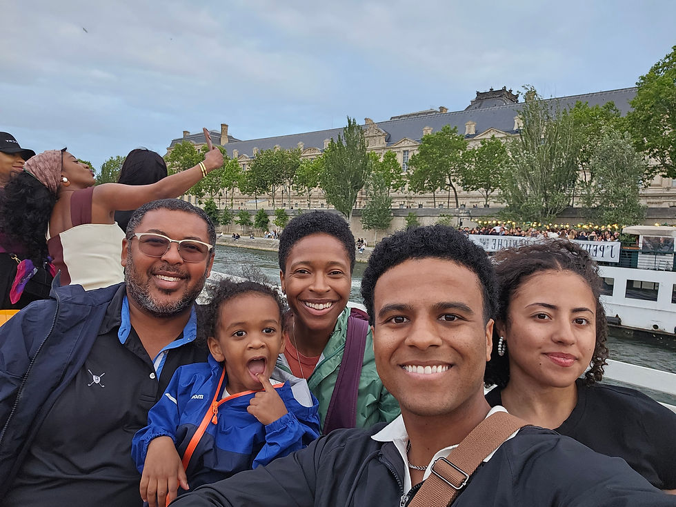 Behind us is the Louvre.