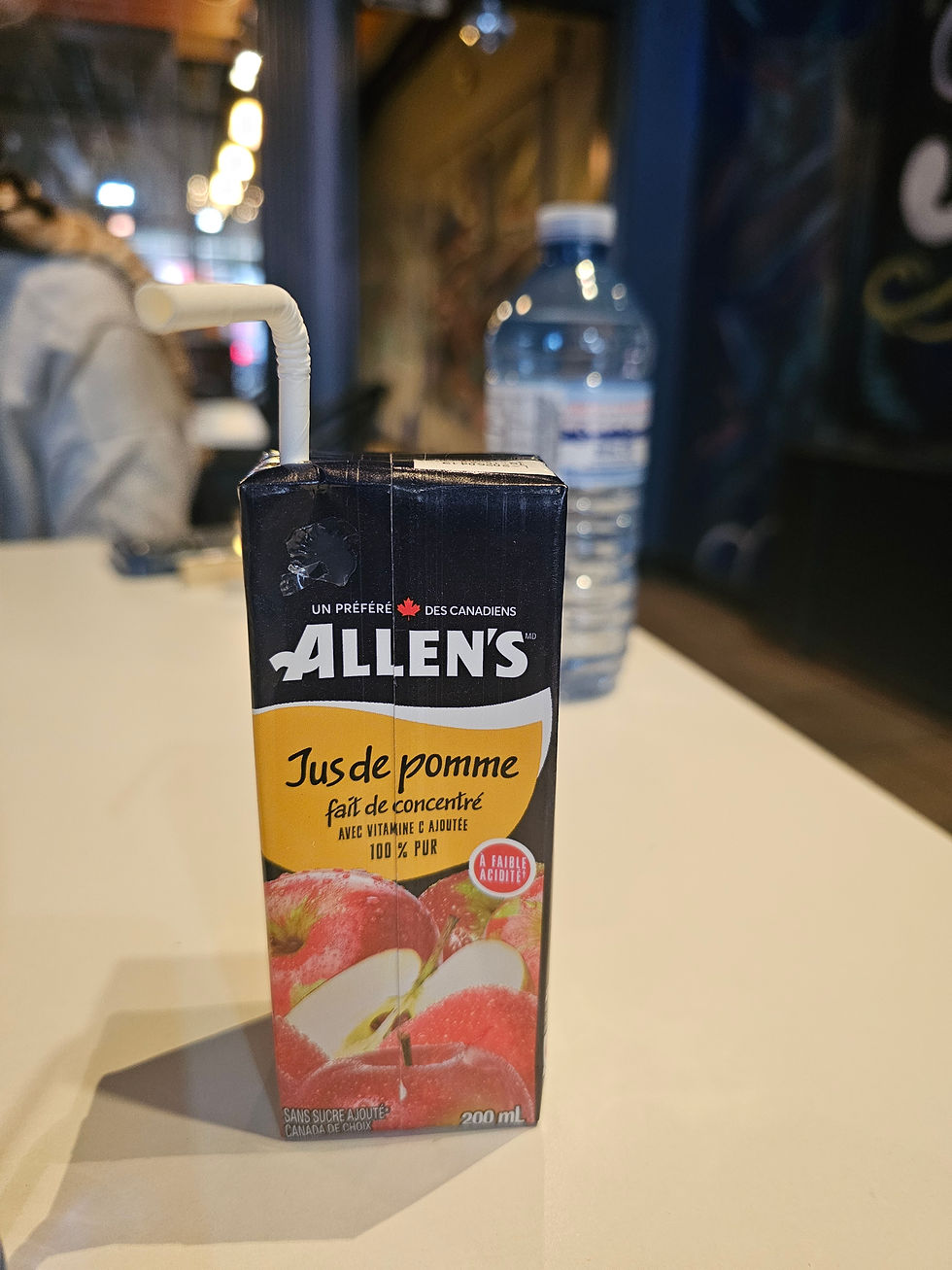 Everything in Canada is in French and English. This is an apple juice we bought at a restaurant while eating a Canadian delicacy; poutine.