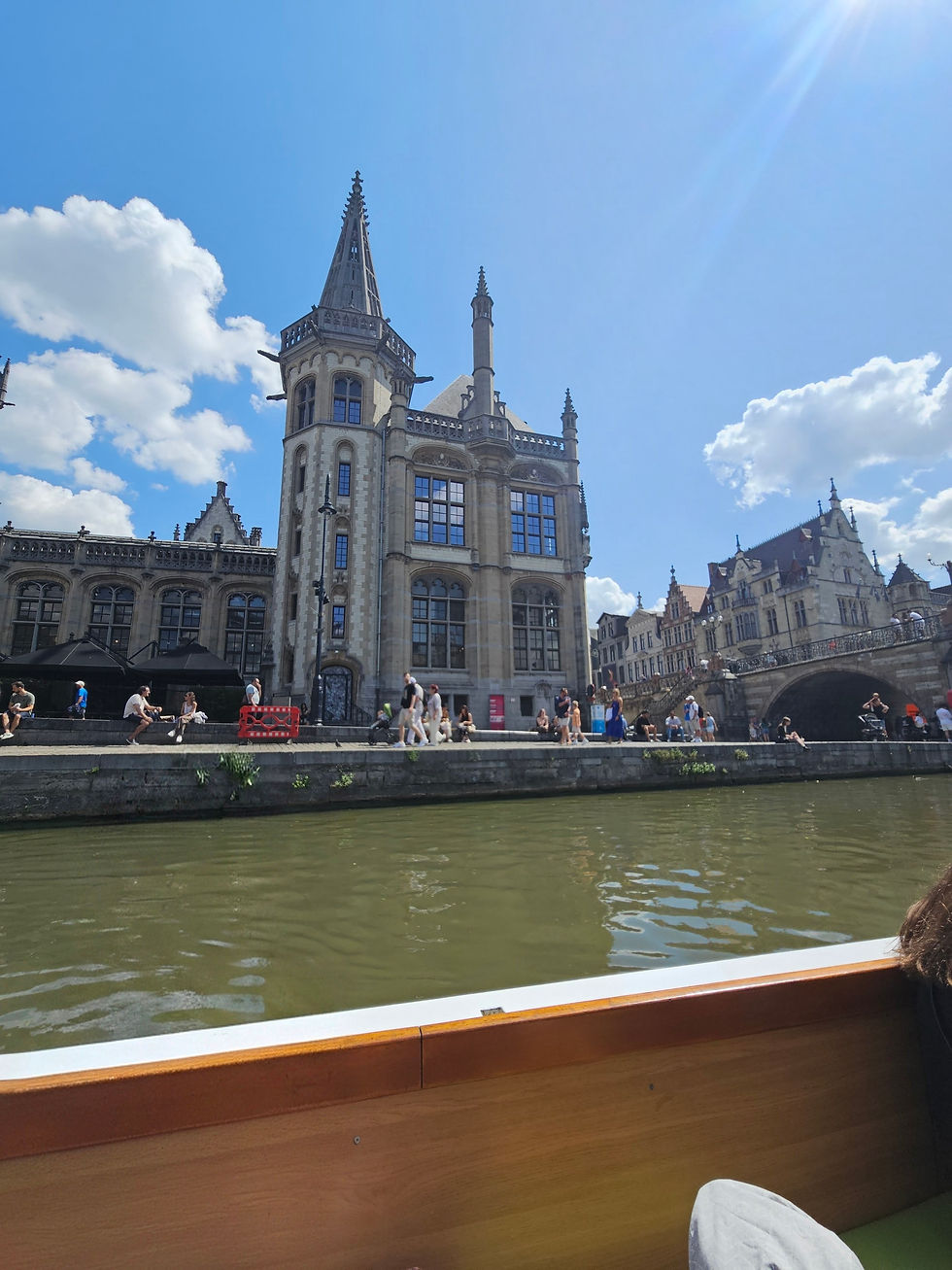 A view of the post office now hotel from the water while on a river tour.
