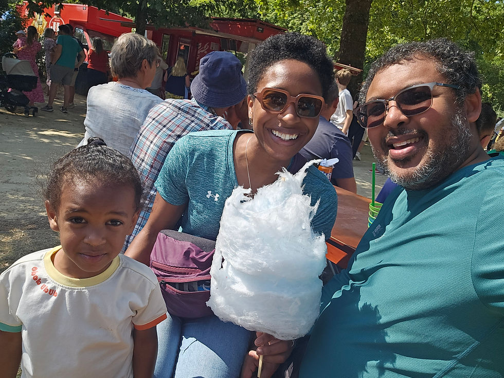 Reliving childhood while enjoying cotton candy.