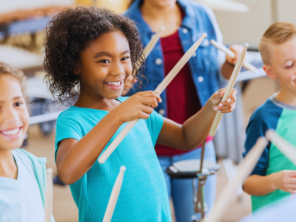 Training rhythm to improve reading and writing skills