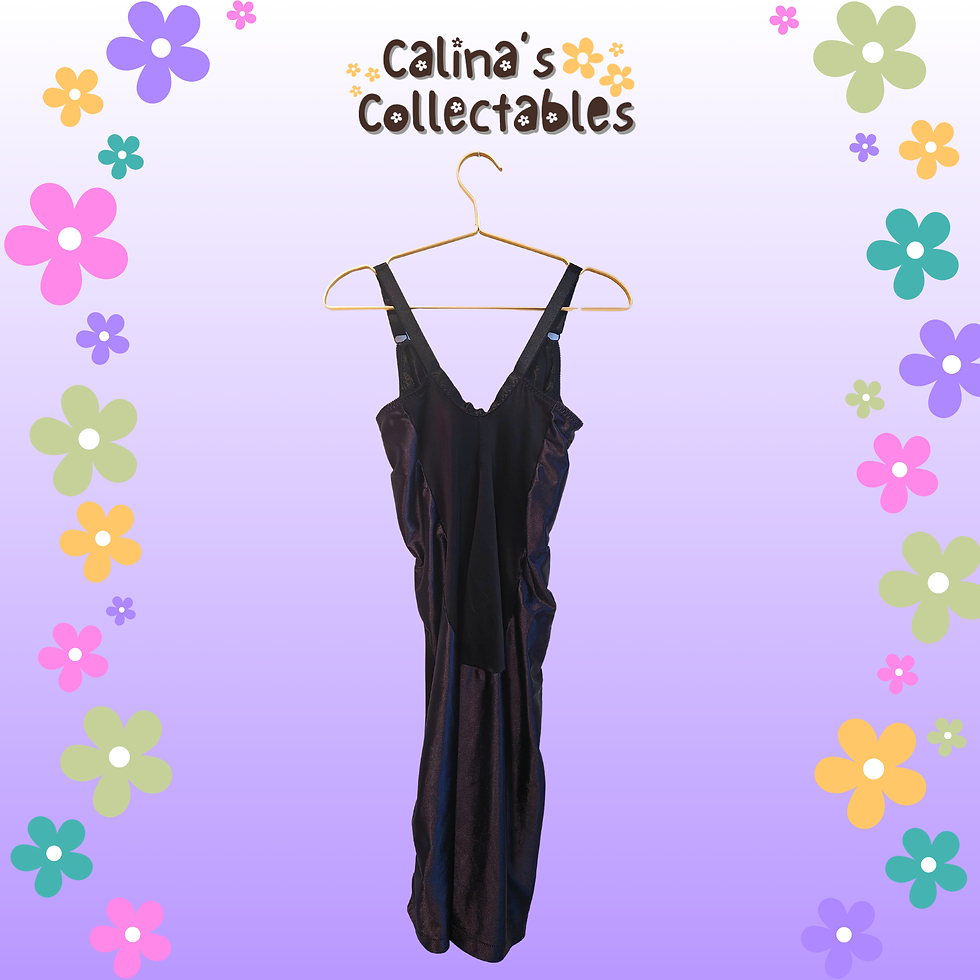 Thumbnail: Black dress hanging on hanger, Calina's Collectables, in front of flowers.