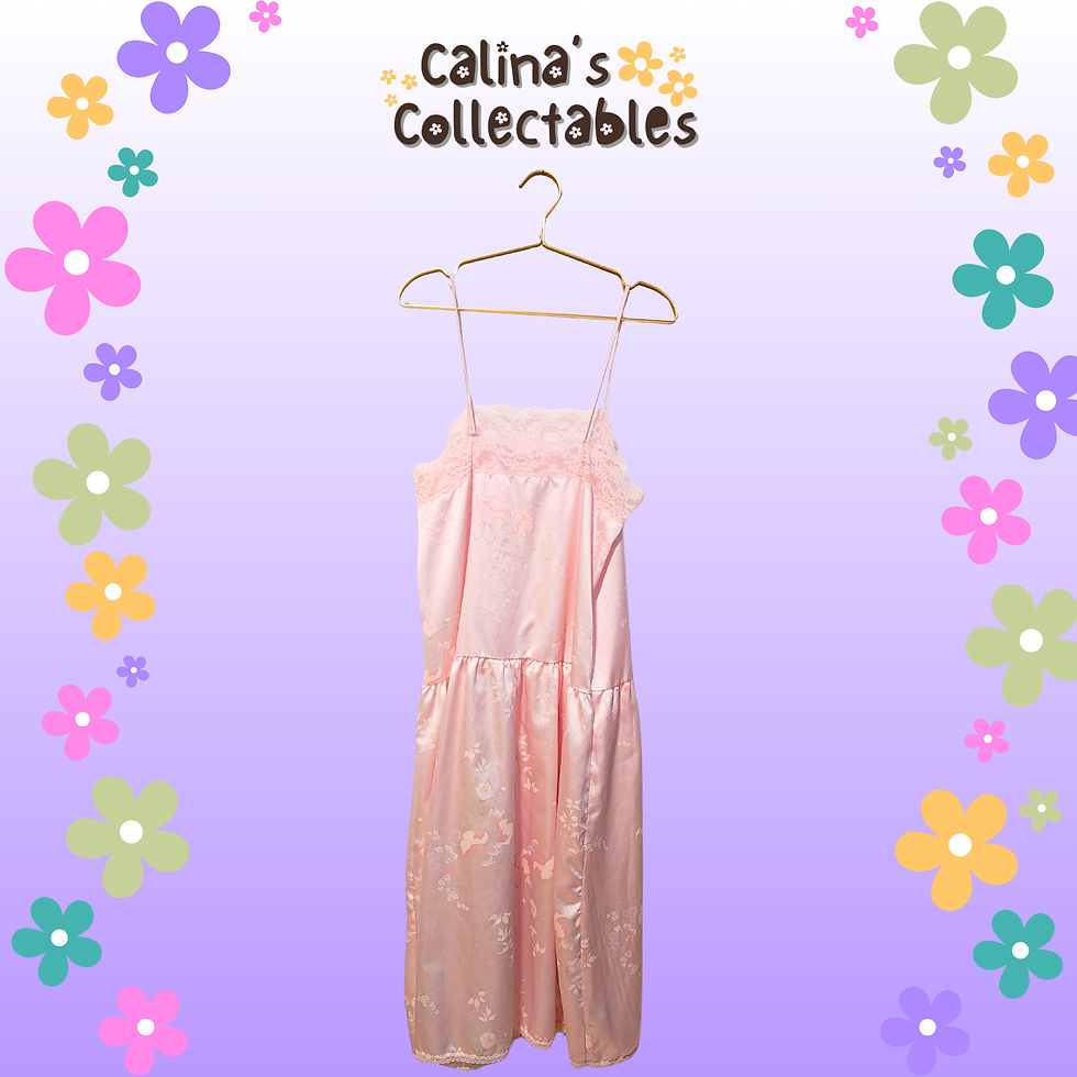 Pink dress on hanger, Calina's Collectables background, floral decor.