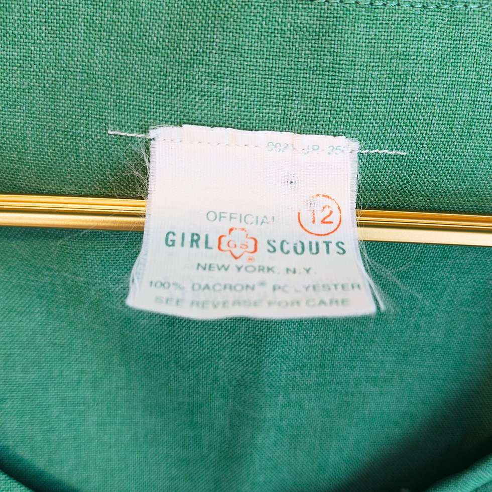 Thumbnail: Girl Scout uniform tag with text: Official Girl Scouts New York, size 12
