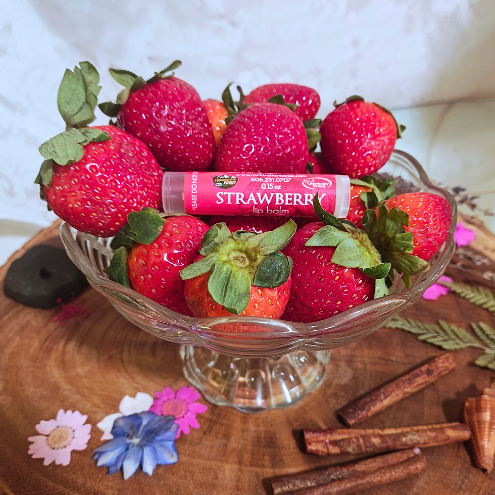 Thumbnail: Fresh strawberries in a glass bowl with Strawberry lip balm on wooden table