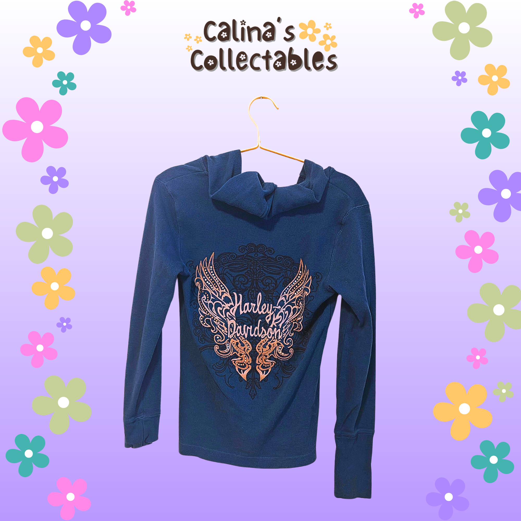 Blue hoodie with a design and text from Calina's Collectables on display.