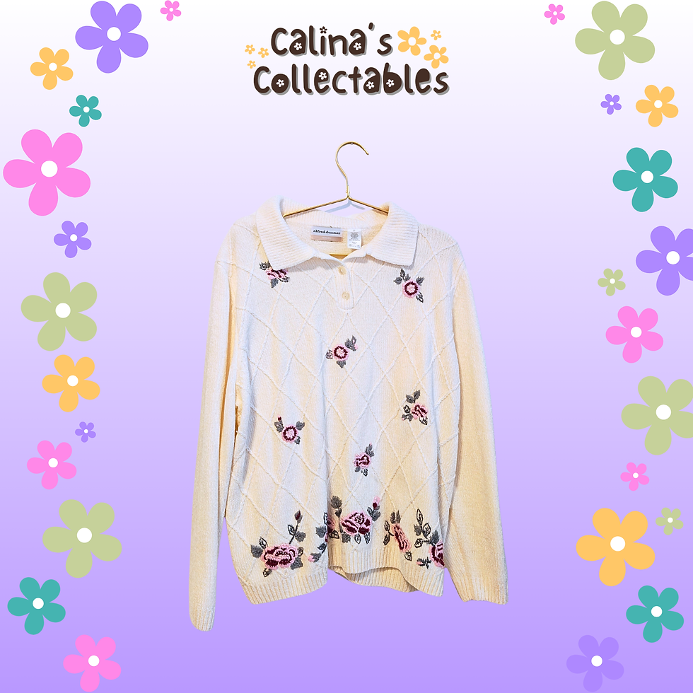 Thumbnail: Cream sweater with floral embroidery, hanging on a clothes hanger, Calina's Collectables.
