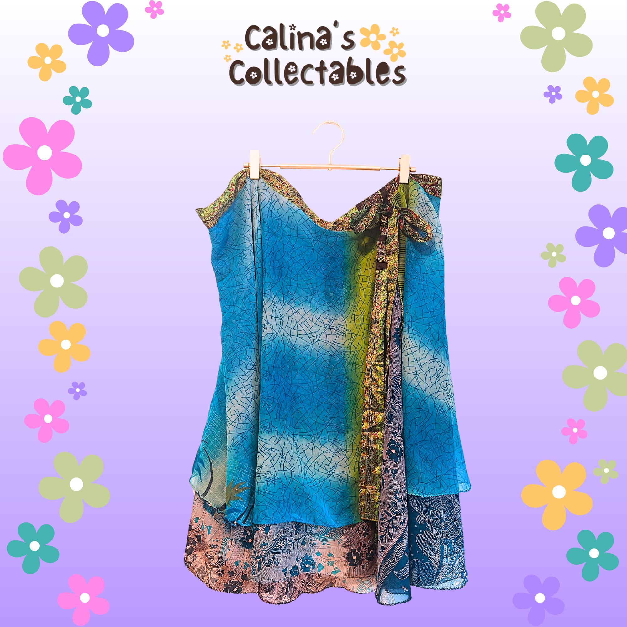 Blue and gold dress hanging on a rack from Calina's Collectables background.