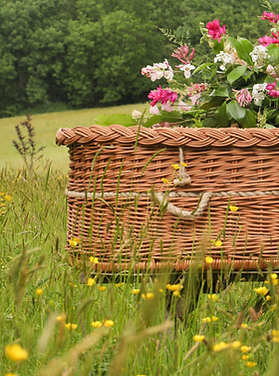 Buff-coloured eco coffin with woven texture