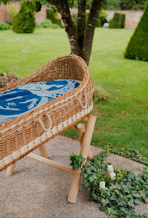 Woven willow shroud cradle with natural blue shroud