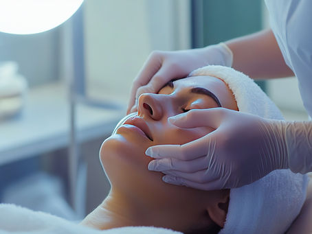 A woman receiving a facial