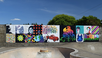 Skate Park with Mural behind.