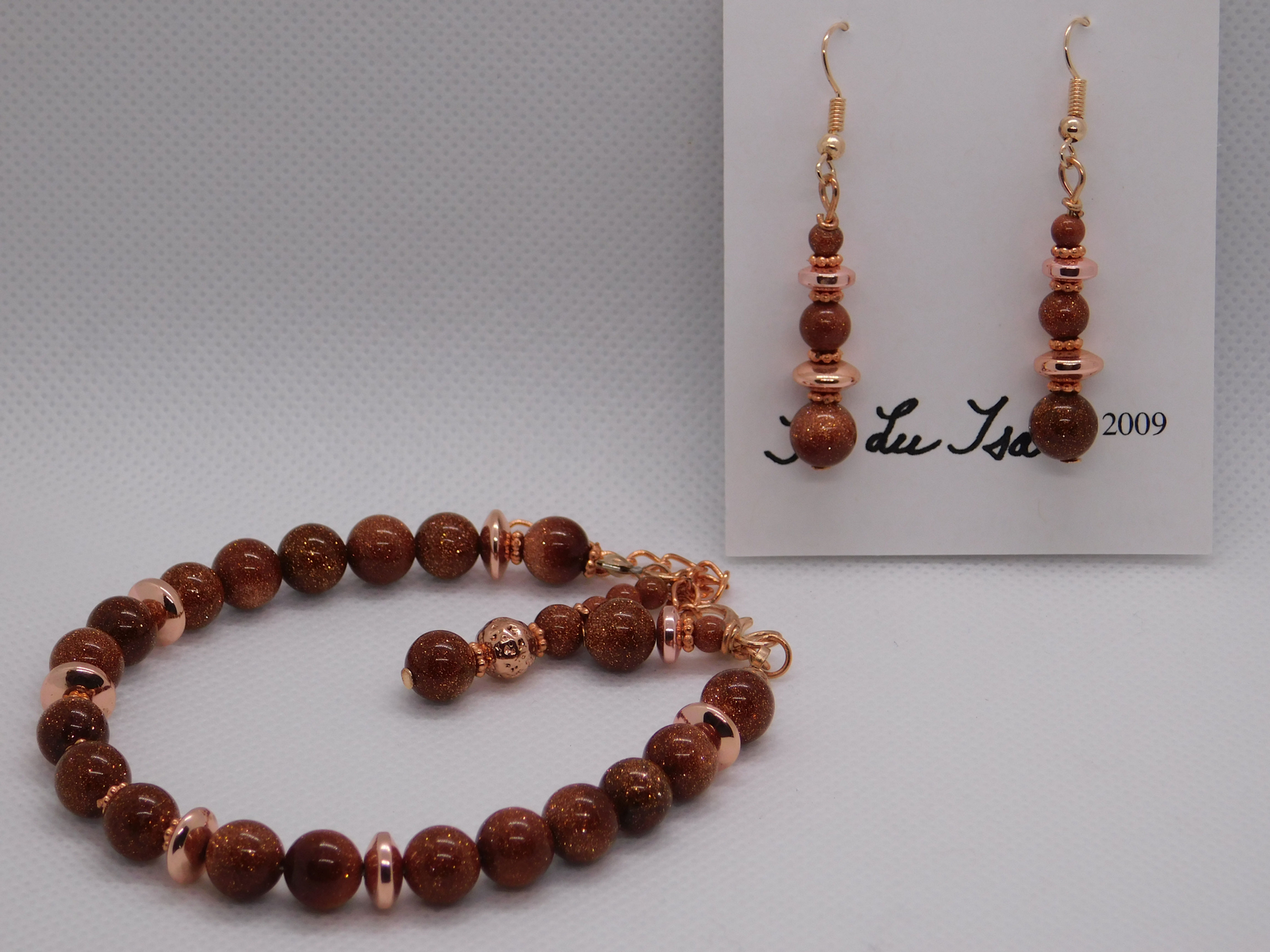 Native American beaded orange bracelet and matching dangle beaded earrings 