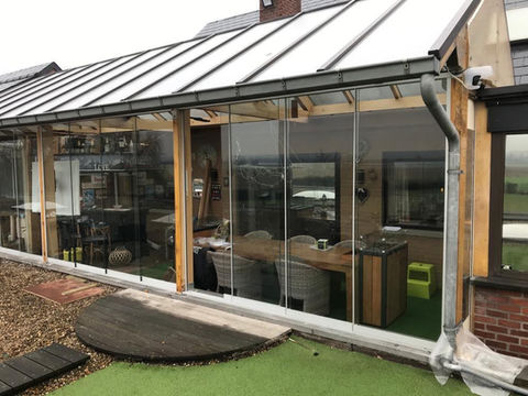 glazen schuifwanden dakterras