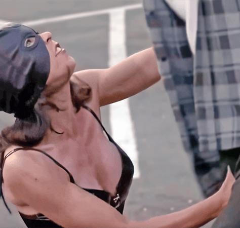 Unknown actress in a leather mask squeezes balls in a fight in "Unk Show" (Unk. Year) - Ballbusting