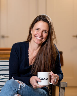 Dana DiPrima with XOXO coffee cup