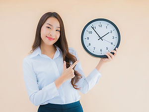 portrait-beautiful-young-asian-woman-show-alarm-clock.jpg