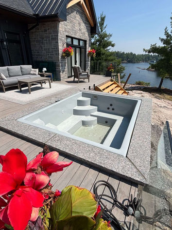 Hot tub with granite coping