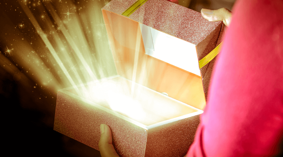 open gift box with light coming out, signifying a present or something remarkable