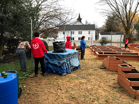 Boy Scouts working in garden