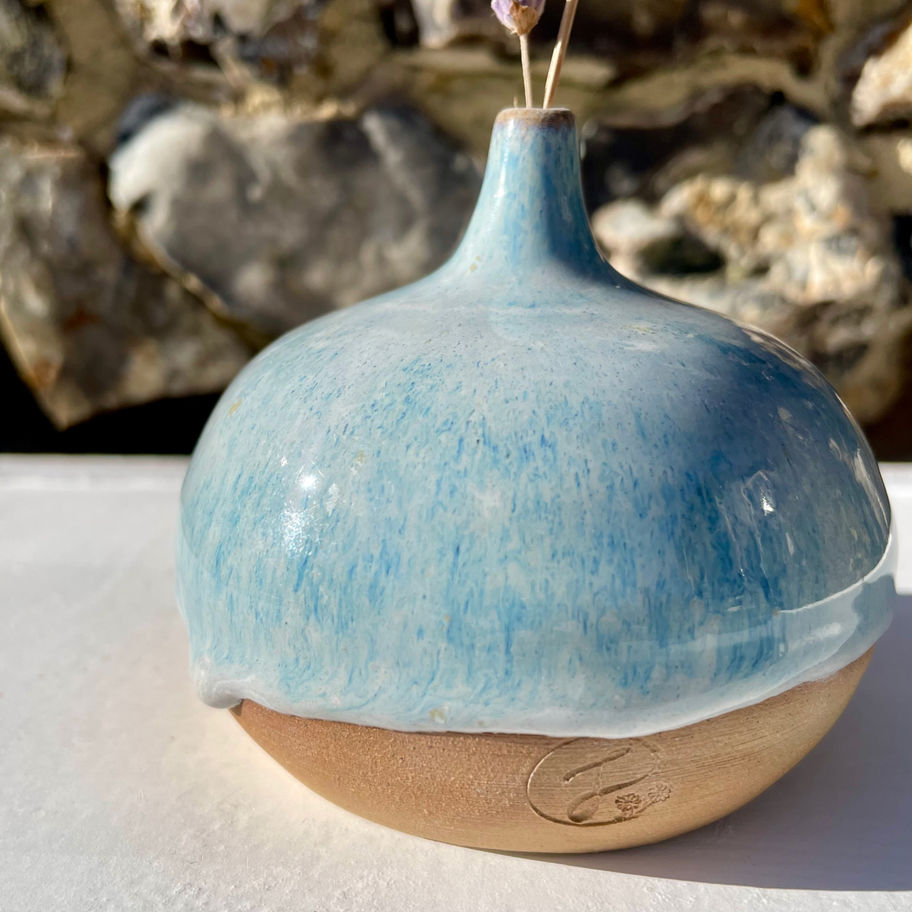 small handmade ceramic vase in ocean blue colours