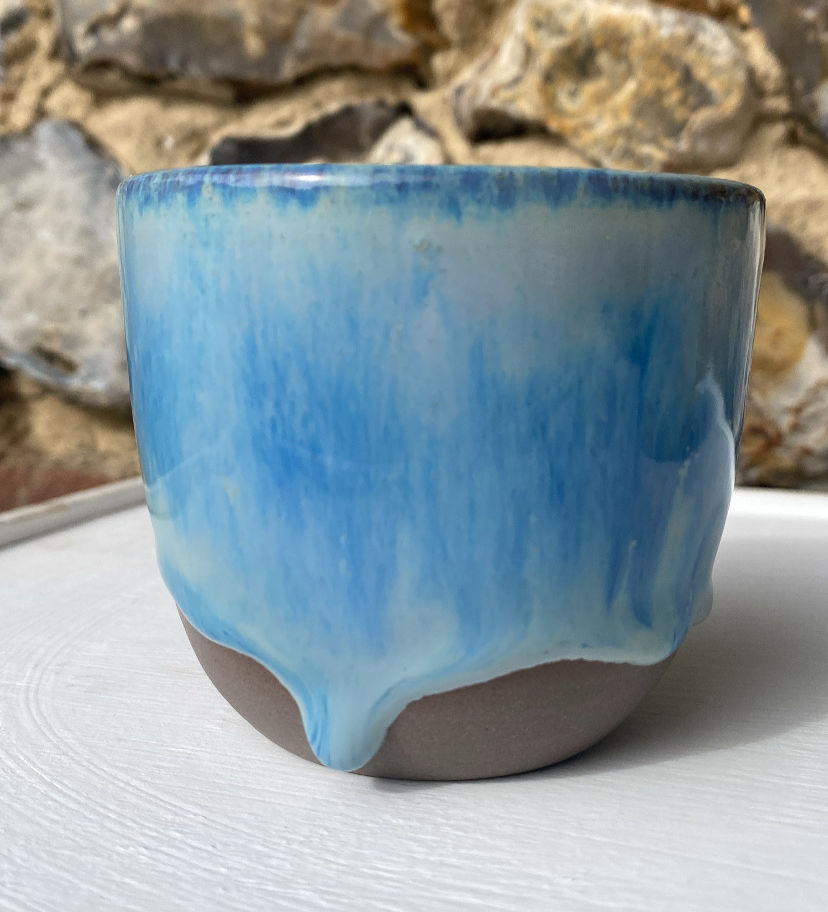 Handmade ceramic mug, grey clay and deep blue wavy glaze