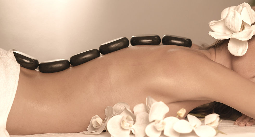 Woman getting a hot stone massage at spa salon__edited_edited.jpg