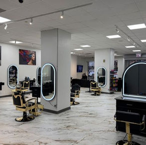 Styling stations inside Elegance Hair Salon & Barbershop at 301 W Washington St
