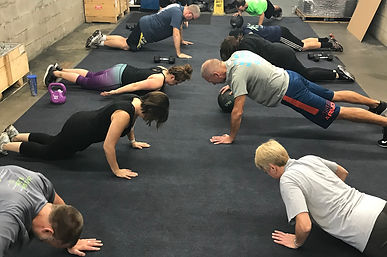 MWI corporate workout. Push ups with different strength level.