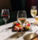 Wine glasses and charcuterie board at The Regal Room in Nolensville, TN