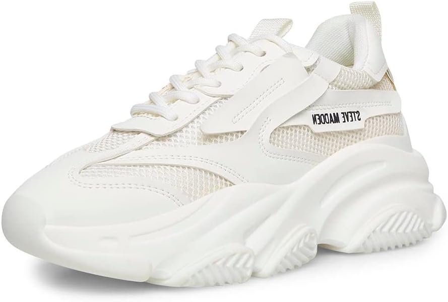 A pair of stylish white sneakers with a modern design featuring mesh and smooth material, ideal for versatile outfits.