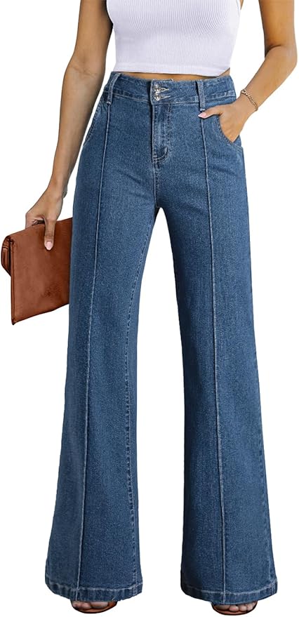 A person wearing a white crop top and high-waisted wide-leg jeans, holding a brown clutch.
