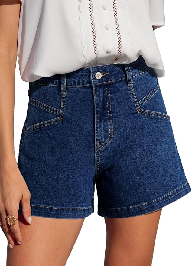 Close-up of a person wearing dark denim shorts and a white button-down shirt, highlighting a casual summer outfit.