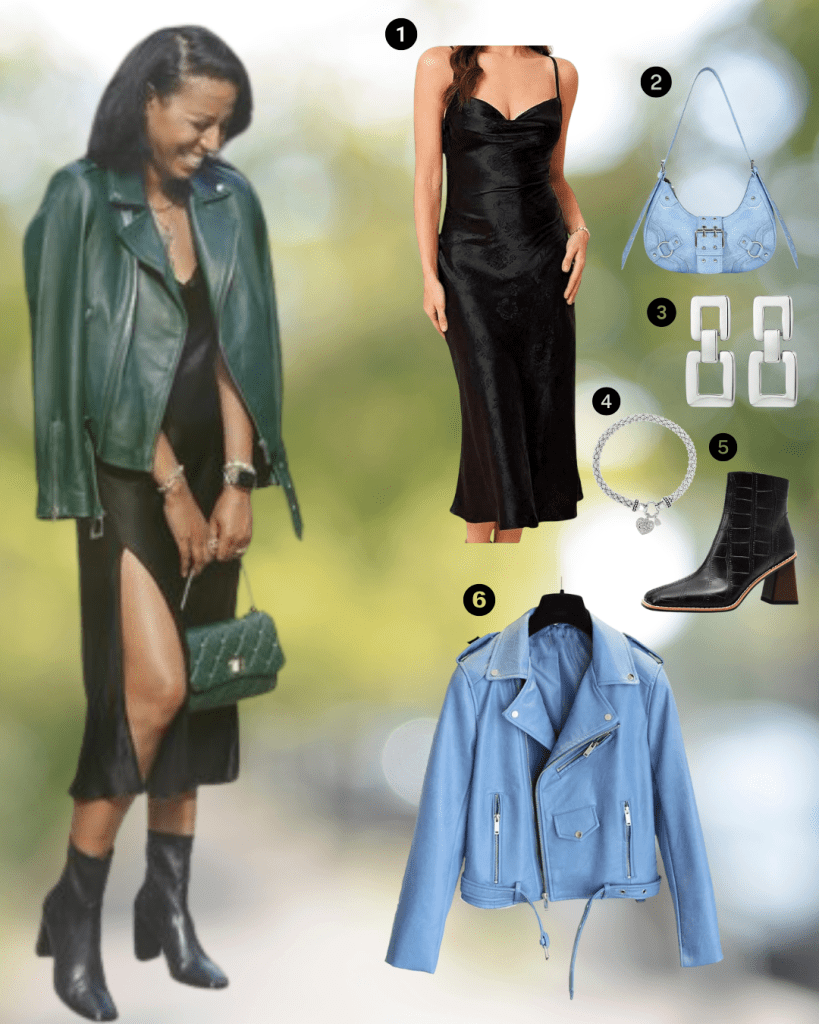 A woman wearing a stylish black slip dress with a high slit, layered with a green leather moto jacket and chunky black boots. She accessorizes with a handbag and jewelry, standing outdoors with a joyful expression.
