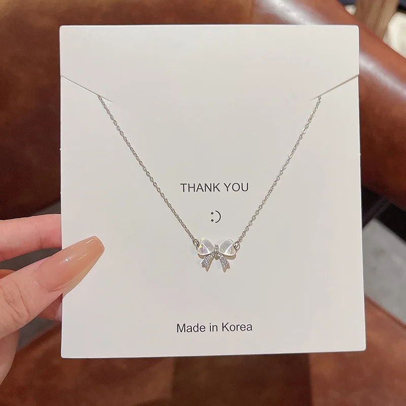 Thumbnail: Opaline Bow Necklace