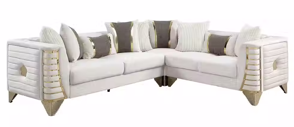 White sectional sofa with gray pillows