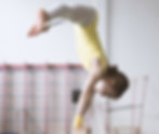 A child gymnast on a balance beam