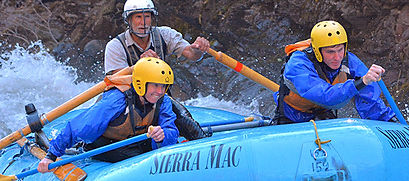 Woman getting splashed on a whitewater rafting trip with ARTA river trips