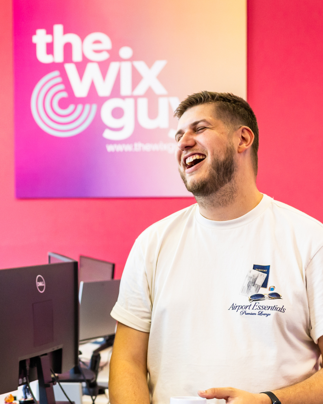 Karl Cowell laughing in The Wix Guys office