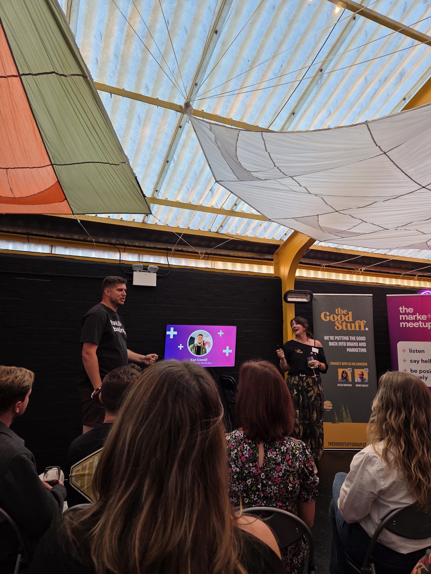 Karl Cowell being interviewed on stage at The Marketing Meetup