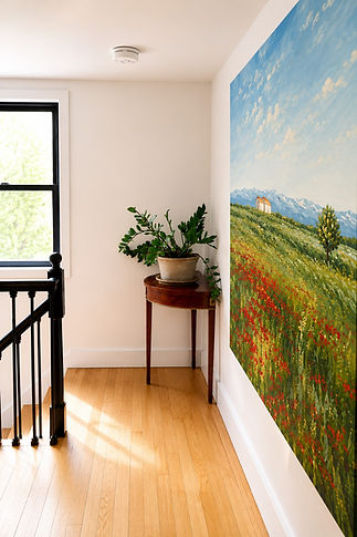 A cheerful landing with natural light, greenery, and statement art.jpeg