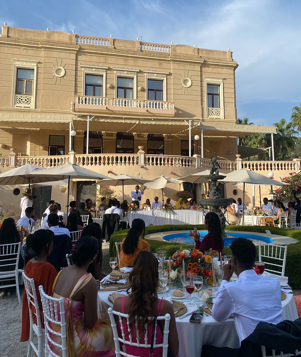 Wedding guests during the speeches in front of Casa de los Bates near Granada