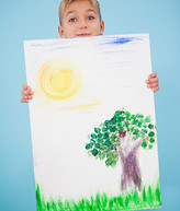 cute-little-boy-showing-his-painting-classroom.jpg