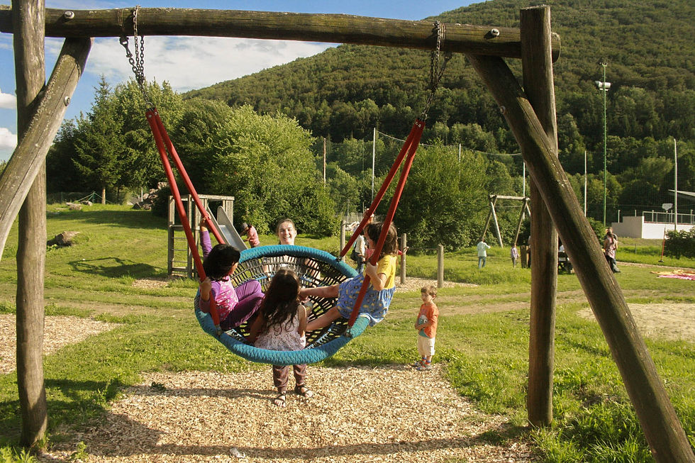 Young girls on a swing